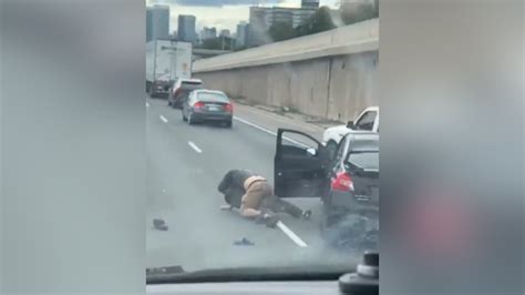 Video shows fists flying during rush hour wrestling match on Toronto highway